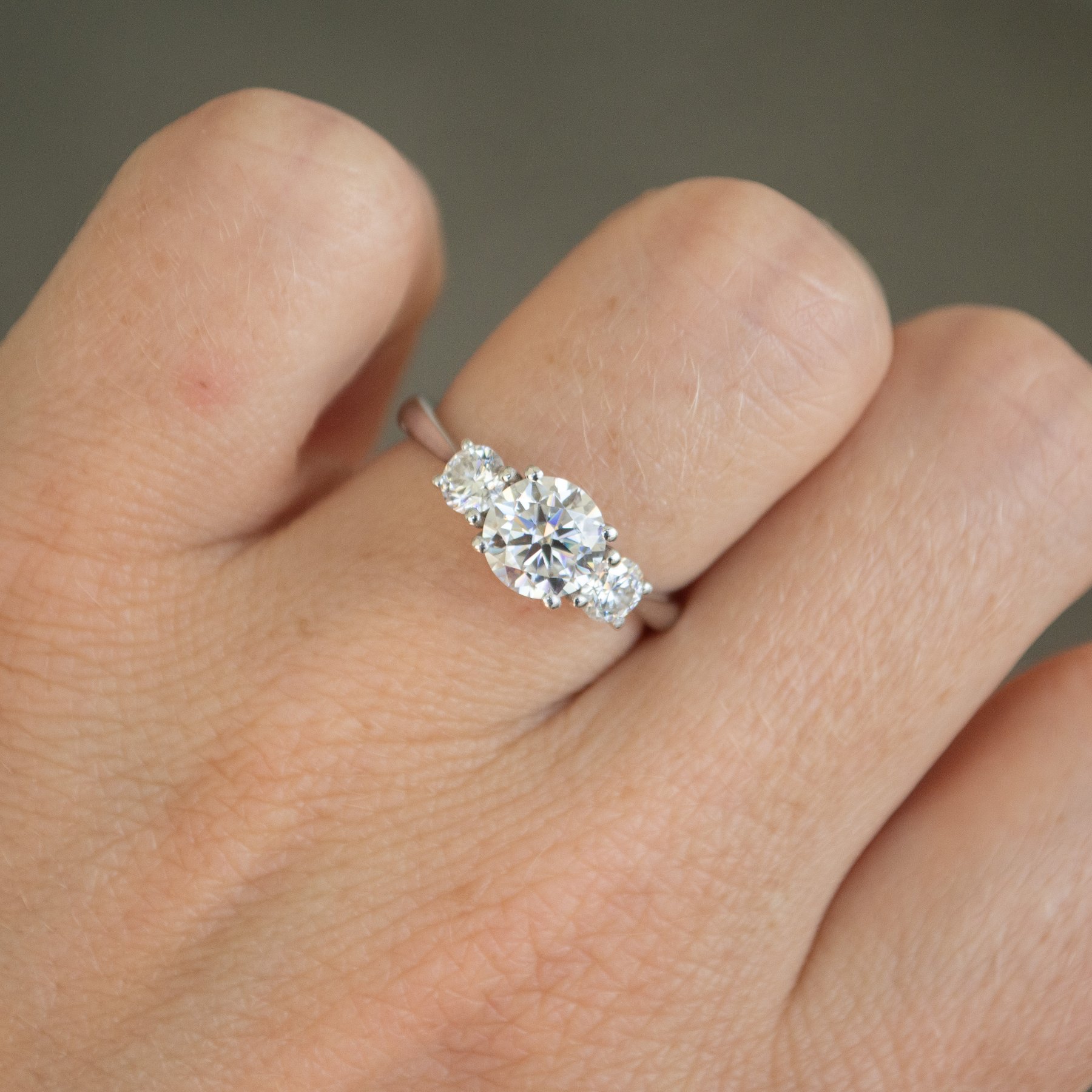 Round Stone Trellis Style Engagement Ring Four Words