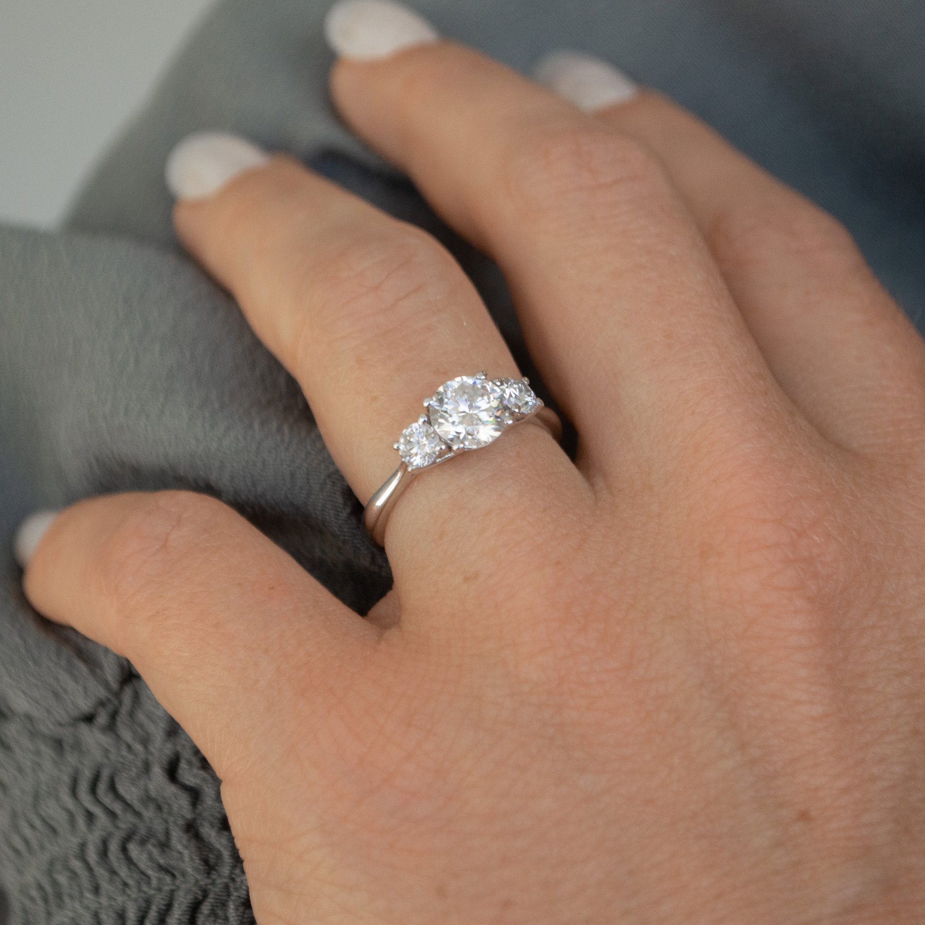 Round Stone Trellis Style Engagement Ring Four Words