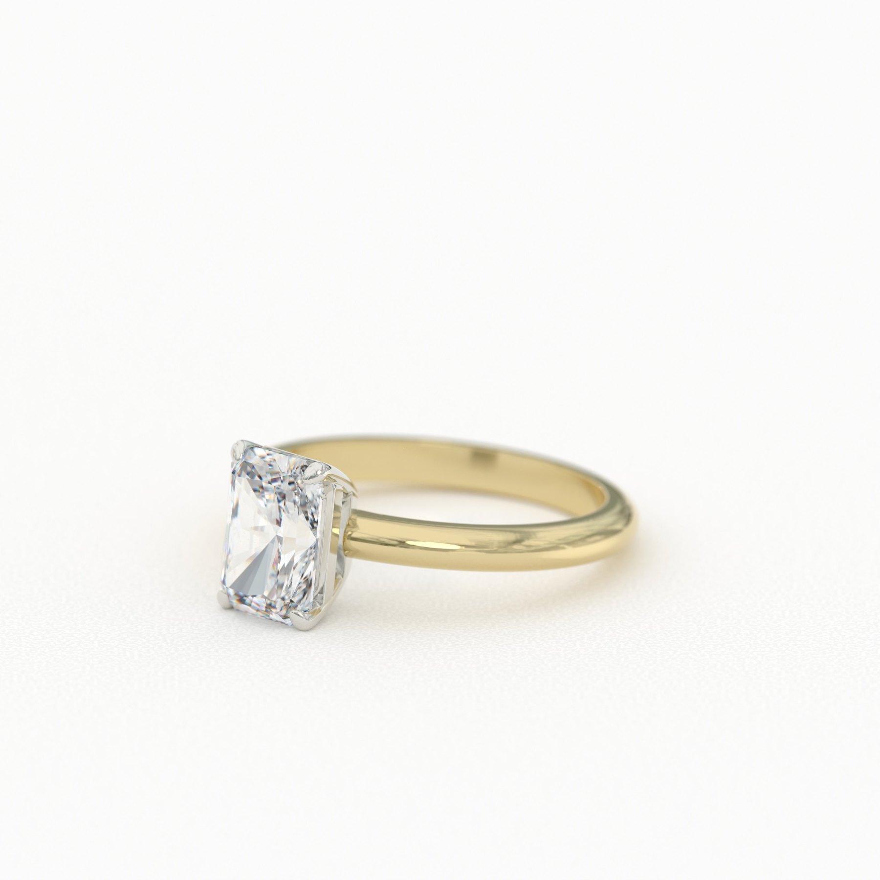 Radiant Cut Solitaire in Four-Prong Basket