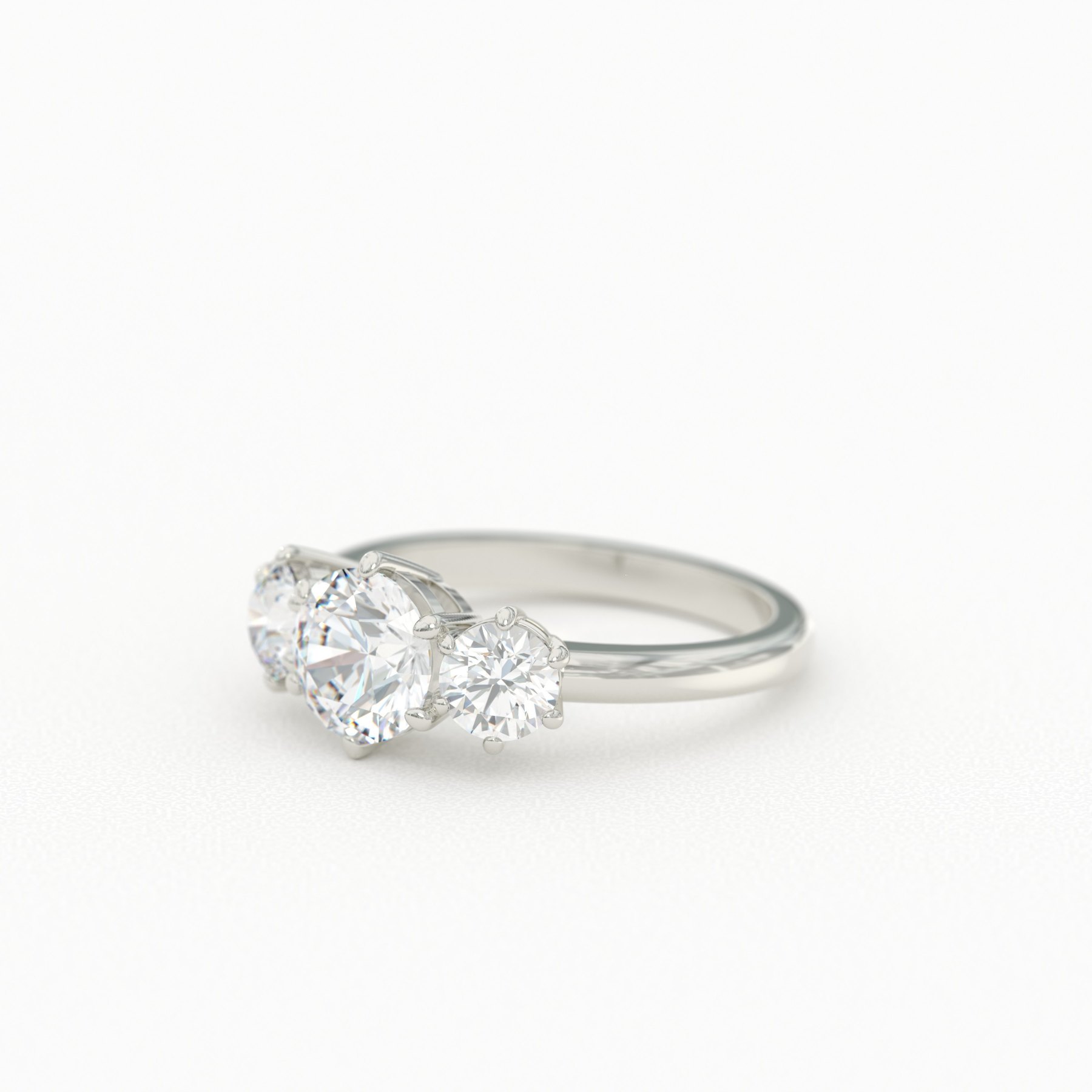 Round Cut Three Stone Ring with Six-Prong Two-Tone Basket