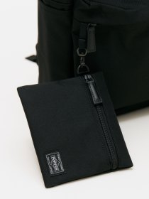 Backpack with detachable pouch