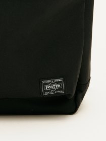 Backpack with detachable pouch