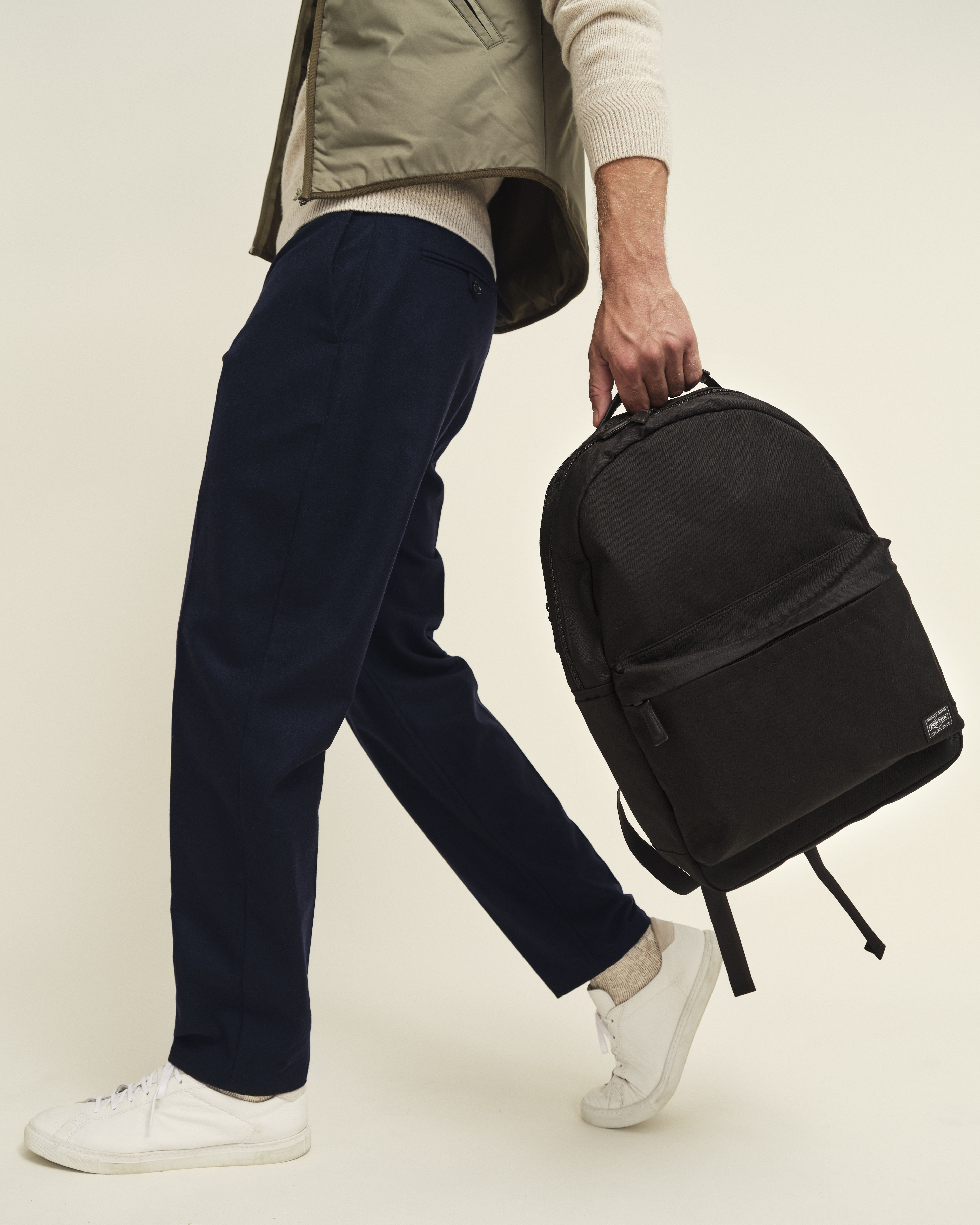 Backpack with detachable pouch