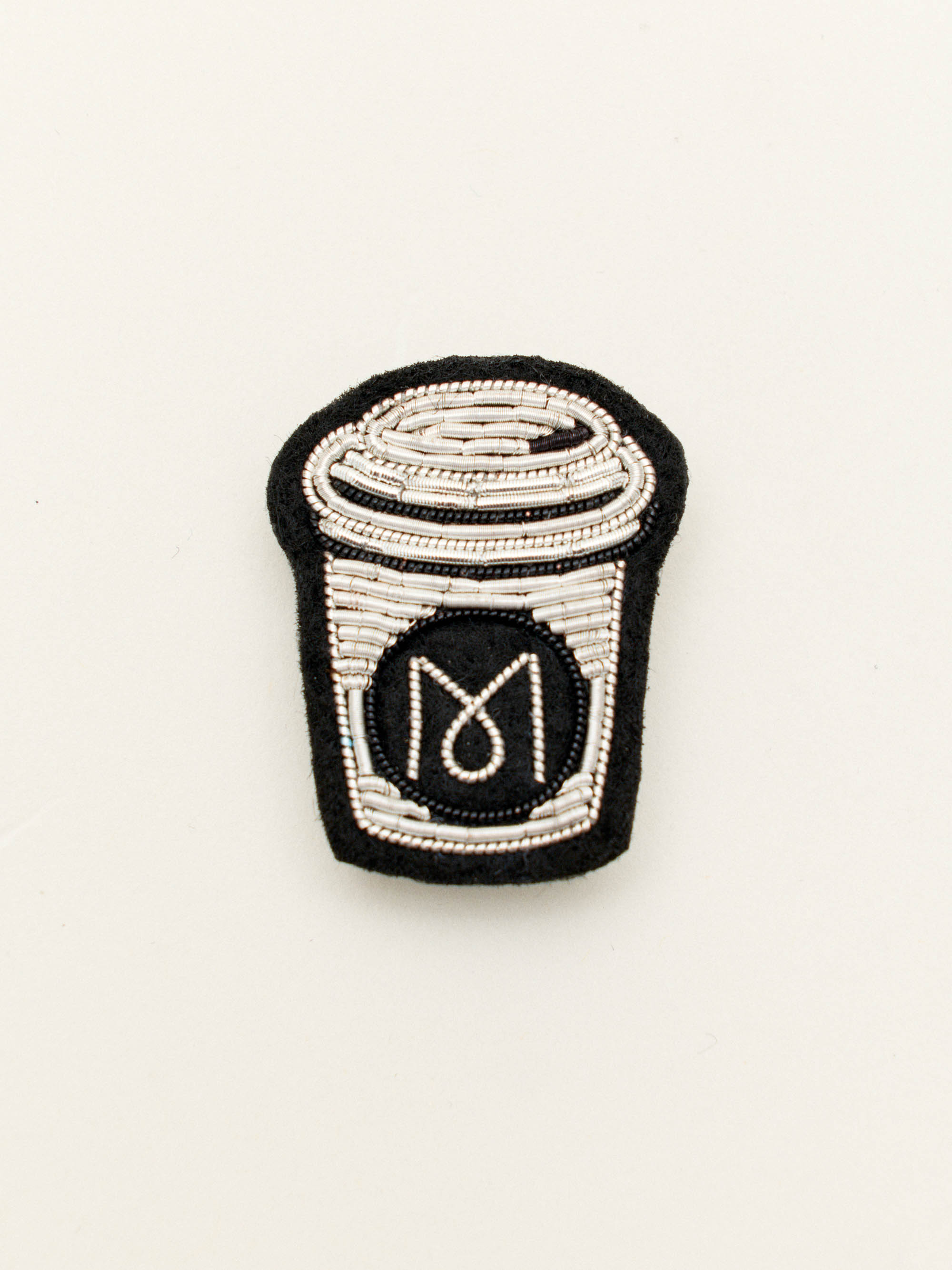 Monocle flat white brooch