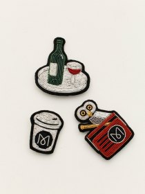 Monocle Radio brooch 
