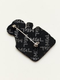 Monocle Radio brooch 